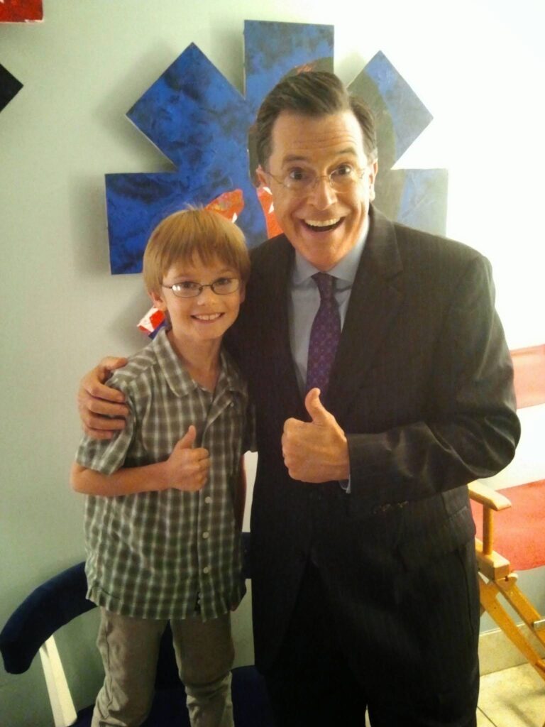 Grayson with Stephen Colbert